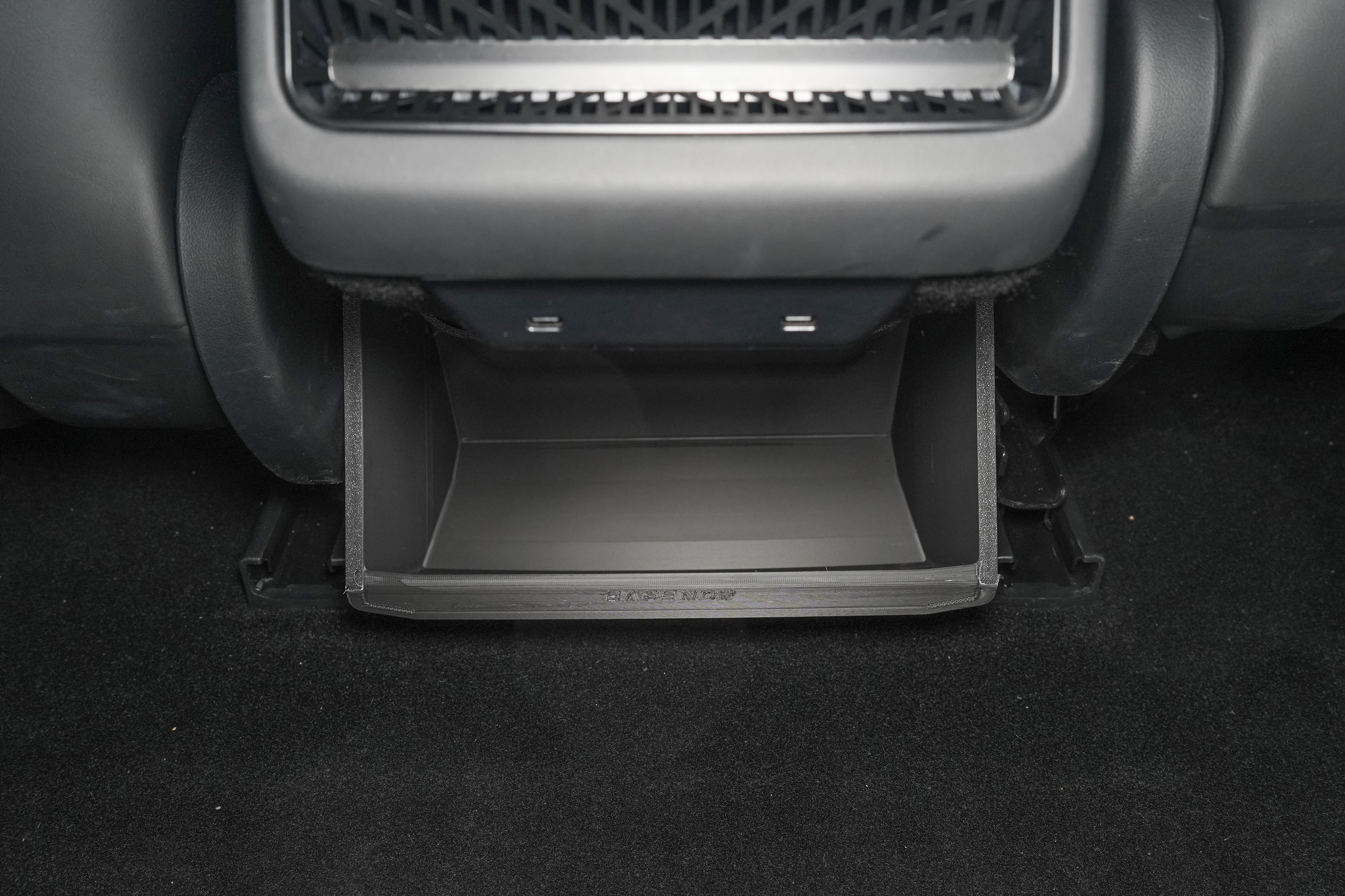 BASENOR rear console organizer installed flush under the rear HVAC vent of a 2024+ Tesla Model 3 Highland, unblocked airflow and USB-C ports