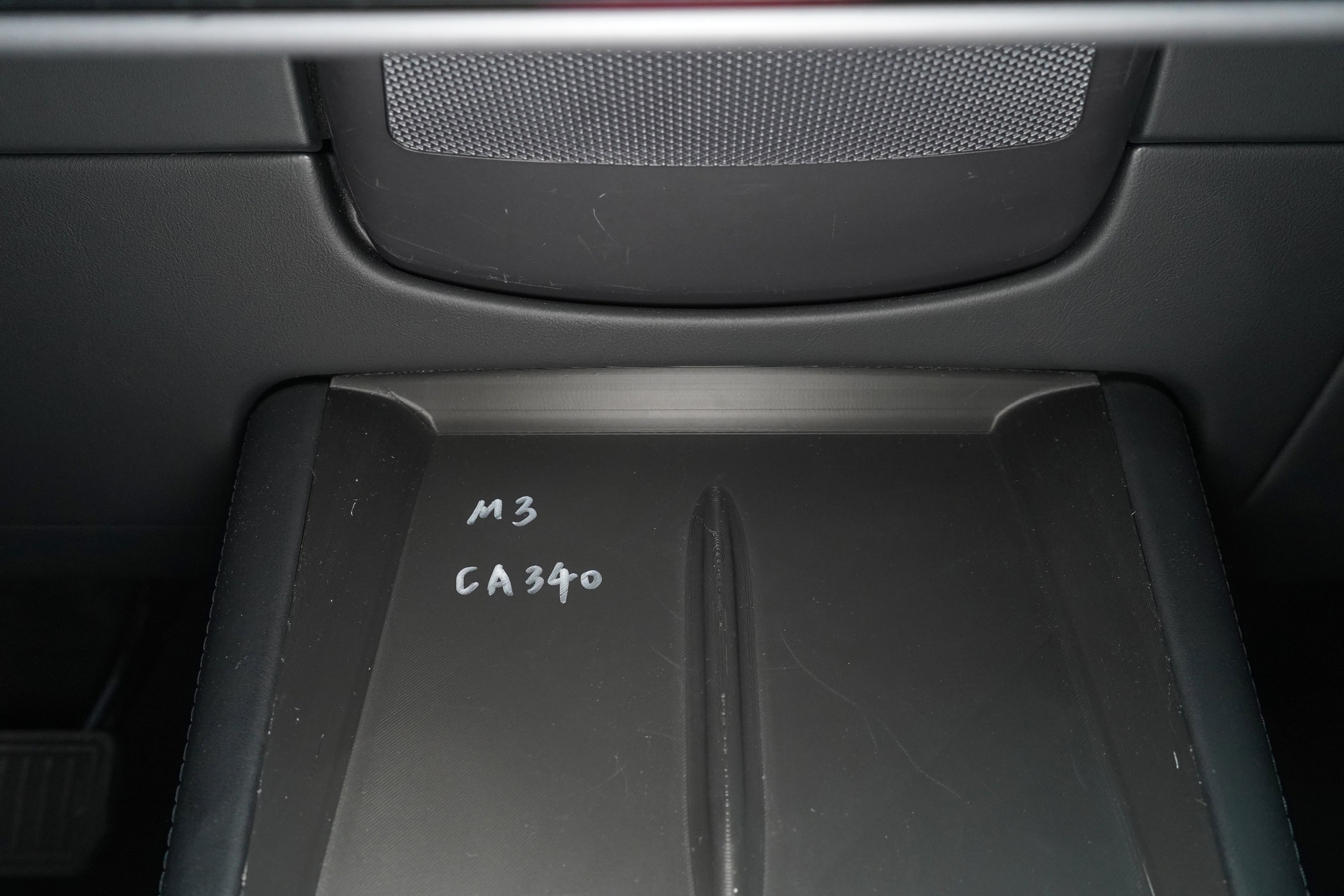 BASENOR silicone wireless charger mat installed on 2024+ Tesla Model 3 Highland charging dock
