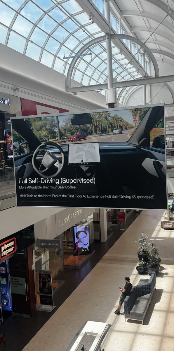 Tesla Rolls Out Massive FSD Banner at New England's Largest Mall