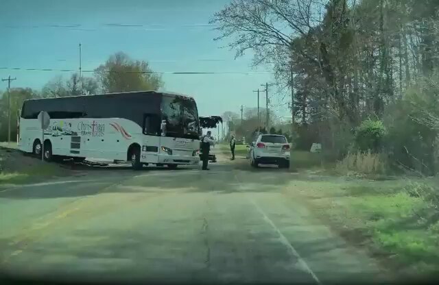 Tesla FSD Navigates Around Bus Crash on Dirt Shoulder