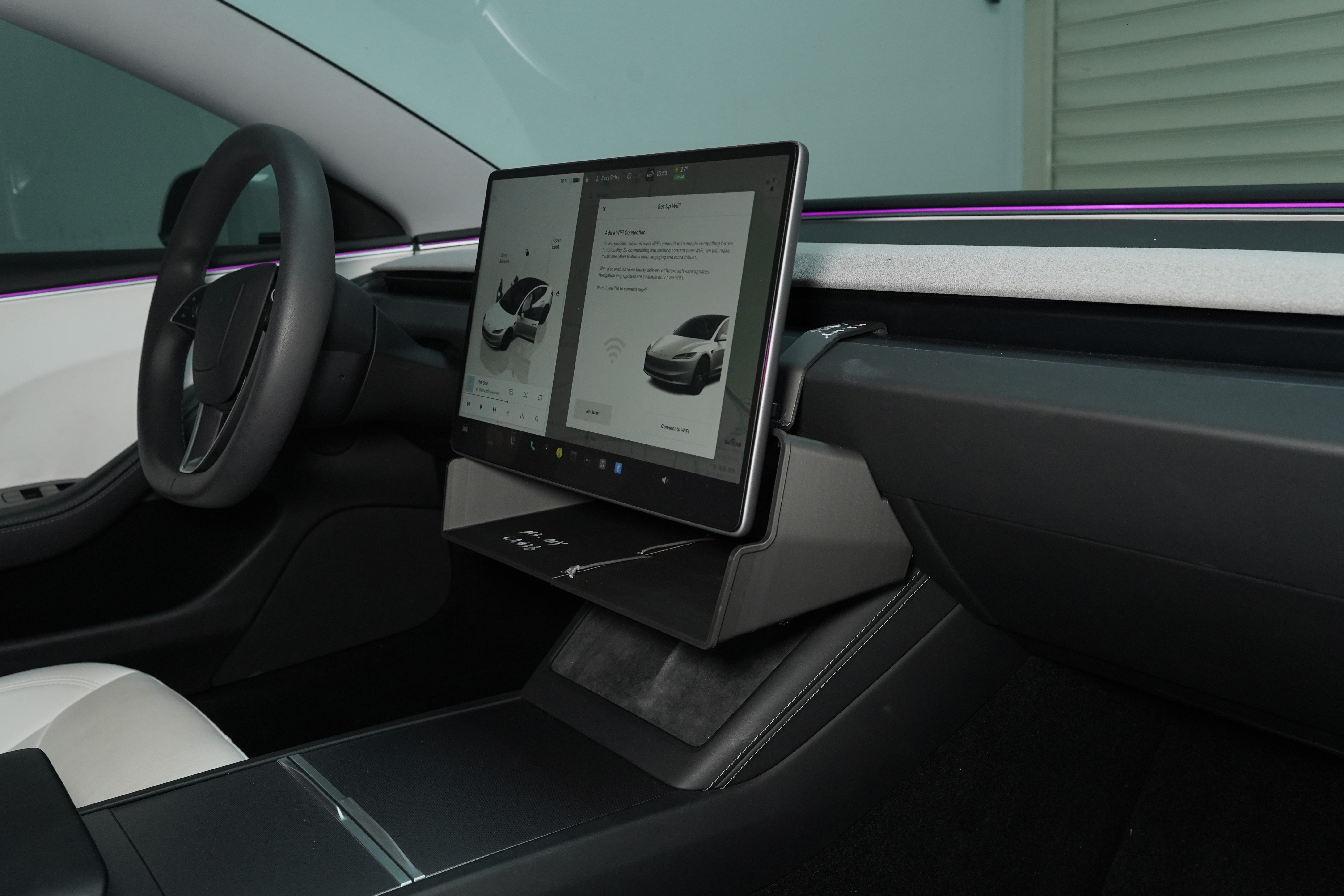 BASENOR under-screen storage box installed in a 2024+ Tesla Model 3 Highland, integrated flush below the touchscreen with the cabin temperature sensor cutout visible