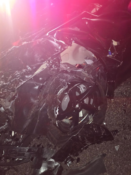 Tesla Model Y Saves Father and Son in Head-On Freeway Crash